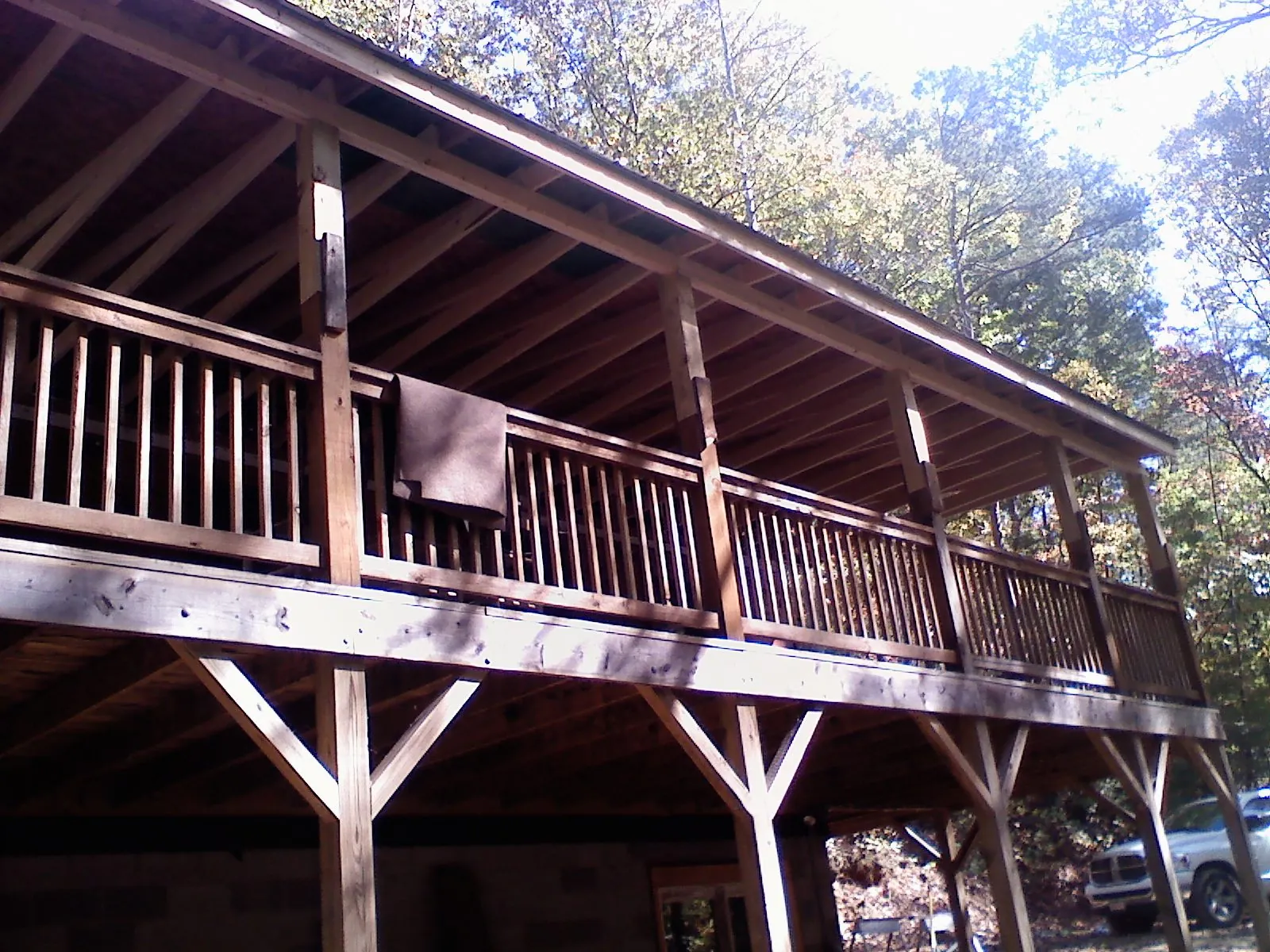 Timber framing under a new elevated porch and deck — Roof Leak Repair in Tippecanoe by Roofing Brothers